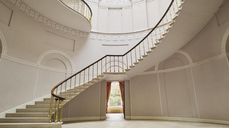 The cantilevered Portland stone staircase was made in England and assembled in the rotunda beneath a coffered dome that is a brilliant visual exercise in geometry. Photograph: Ros Kavanagh