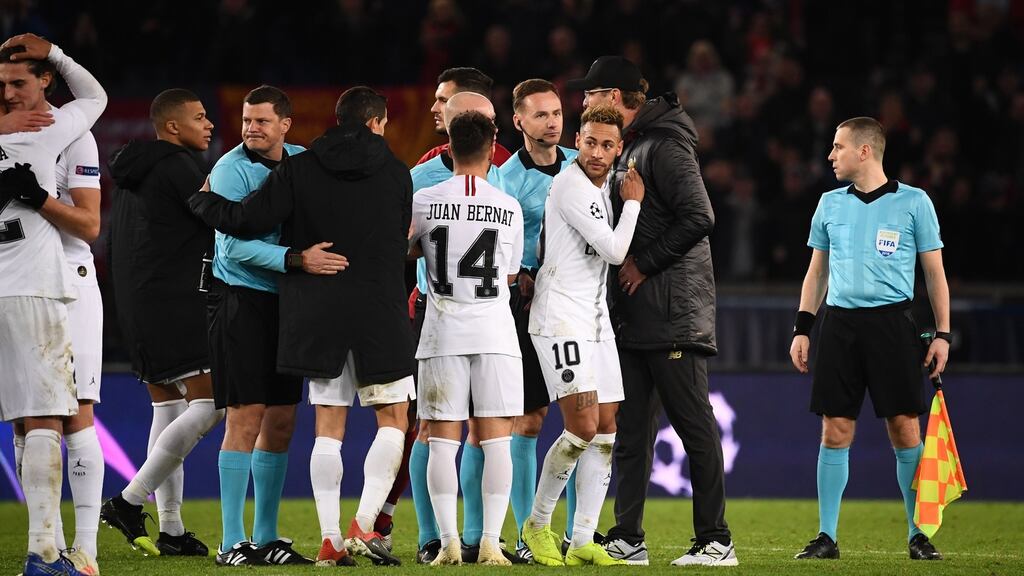 Paris Saint-Germain’s Neymar stands in front of Liverpool manager Jurgen Klopp after he remonstrates with the referee following their Champions League defeat. Photo: Franck Fife/Getty Images