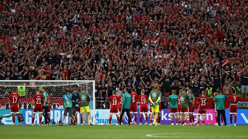 Hungary players applaud their supporters in Budapest after their 3-0 defeat to Portugal. Photograph: Bernadett Szabo/Getty