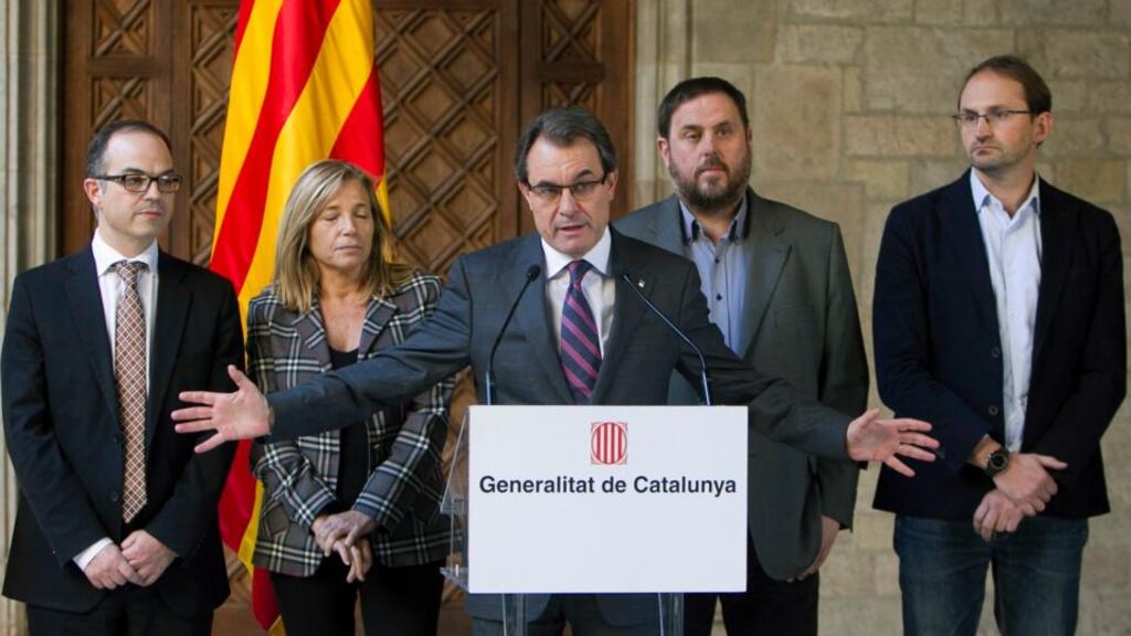 Catalonia’s president Artur Mas, with other regional party leaders, speaks during a news conference on Thursday announcing the date for a referendum on Catalan independence referendum. Photograph: Reuters