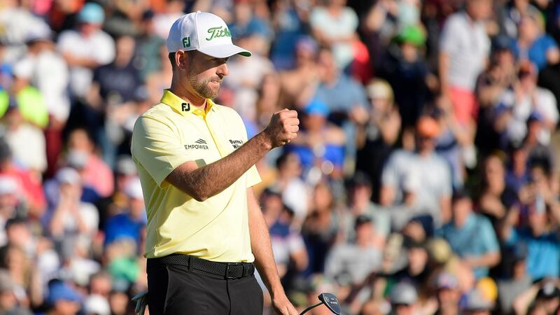 Webb Simpson celebrates  on the 18th green during the final round of the Waste Management Phoenix Open  in Scottsdale, Arizona. Photograph:  Steven Ryan/Getty Images