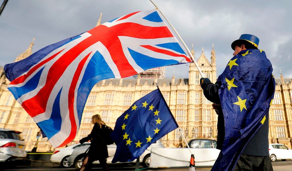 An anti-Brexit demonstrator outside the Houses of Parliament in London. Conservative Brexiteers said they would vote against the draft Brexit deal. Photograph: Tolga Akmen/AFP/Getty Images