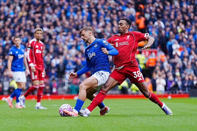 Everton's Kiernan Dewsbury-Hall is tackled by Liverpool's Ryan Gravenberch during the Premier League match at Anfield. Photograph: Peter Byrne/PA Wire