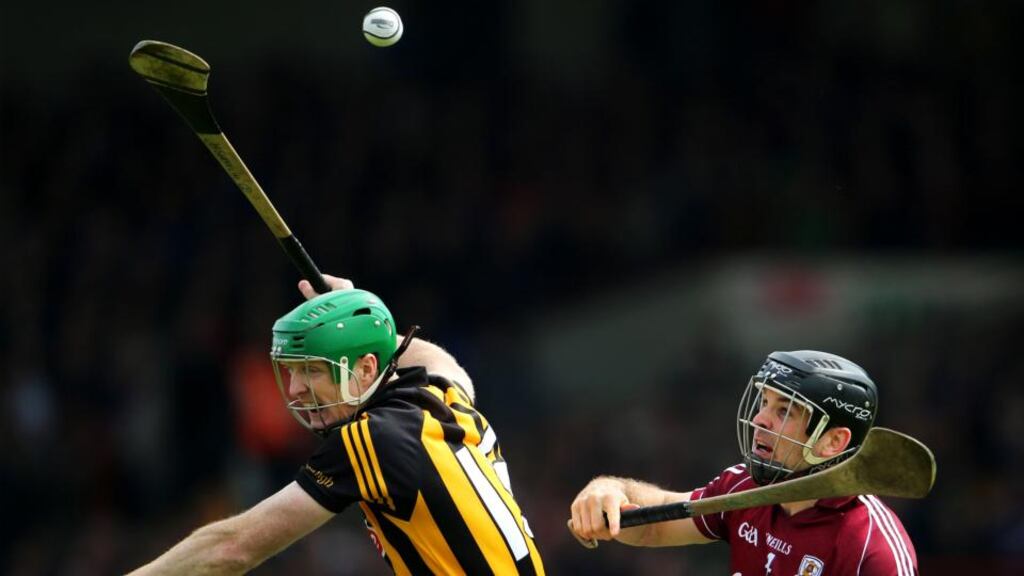 Kilkenny’s Henry Shefflin and David Collins battle for possession during the Allianz Hurling League Division One semi-final at the  Gaelic Grounds in Limerick. Photograph:  Cathal Noonan/Inpho