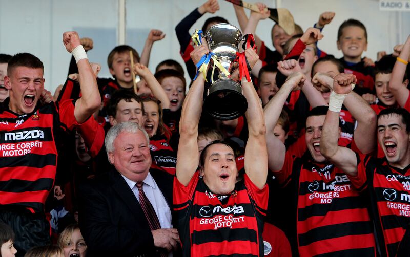 Ballygunner captain Shane O'Sullivan lifts the trophy after the Waterford county hurling final. Photograph: James Crombie/Inpho