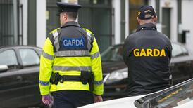 Garda overtime being curtailed, not banned, says Justice Minister