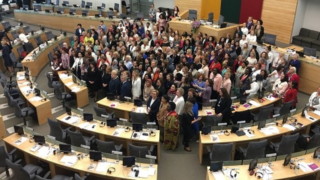 Delegates pose for the group shot at the Women Political Leaders conference in the Seimas, Vilnius. Photograph: Elaine Edwards/The Irish Times