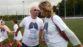 Joan Burton attempts to break world record for kissing chain