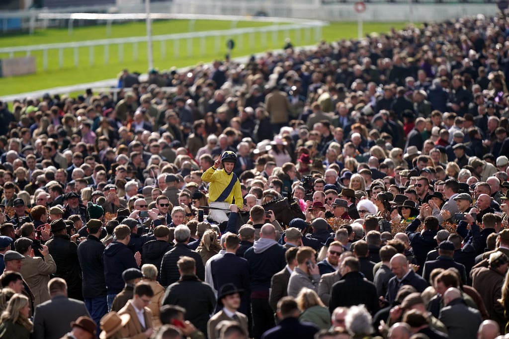 Cheltenham Festival crowds greet winner Marine Nationale and jockey Michael O'Sullivan. Irish company, Future Ticketing, has won a contract with the venue's owner, The Jockey Club. Photograph: Tim Goode, PA Wire/PA Images.