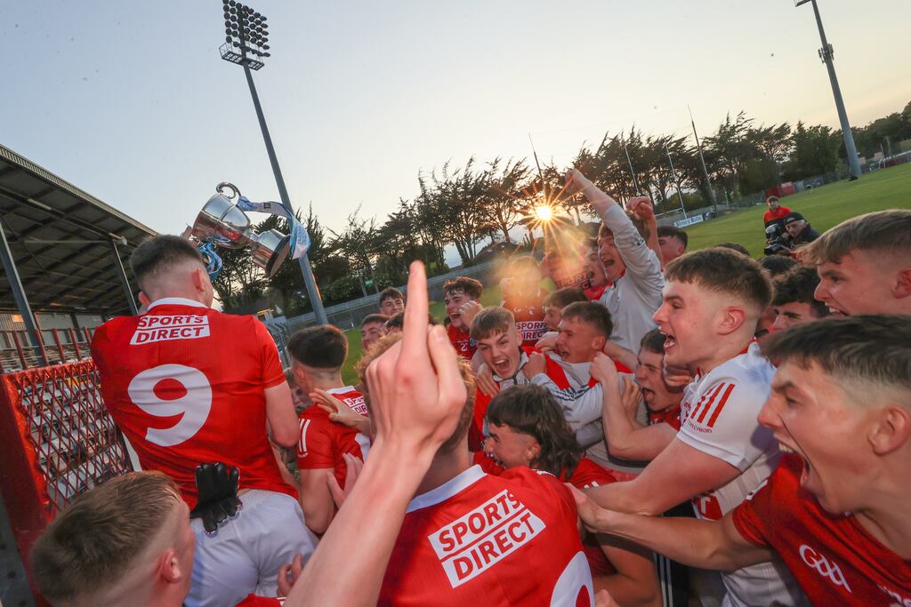 The Cork players celebrate winning the Munster minor title at Pairc Ui Rinn. Photograph: Bryan Keane/Inpho