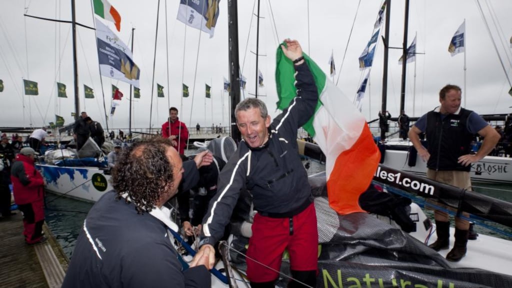 Tom Murphy congratulates team-mate Maurice “Prof” O’Connell from Roxy 6 at the conclusion of the Commodores’ Cup at Cowes in 2010 which Ireland won. Photograph: David Branigan/Oceansport