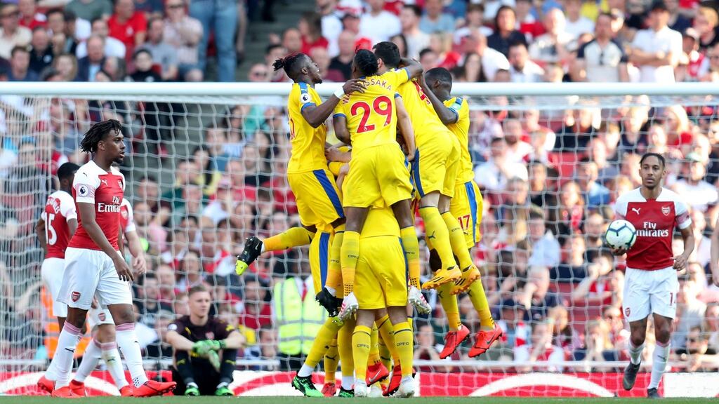 Crystal Palace’s James McArthur celebrates scoring his side’s third goal at the Emirates Stadium. Photograph: PA
