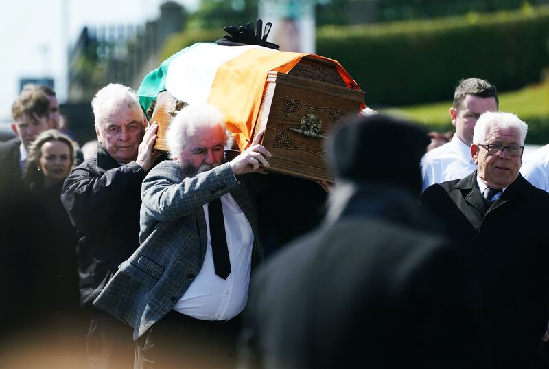 The coffin of Colm Murphy is carried to the Church of St Laurence O'Toole in Belleeks, Co Armagh.