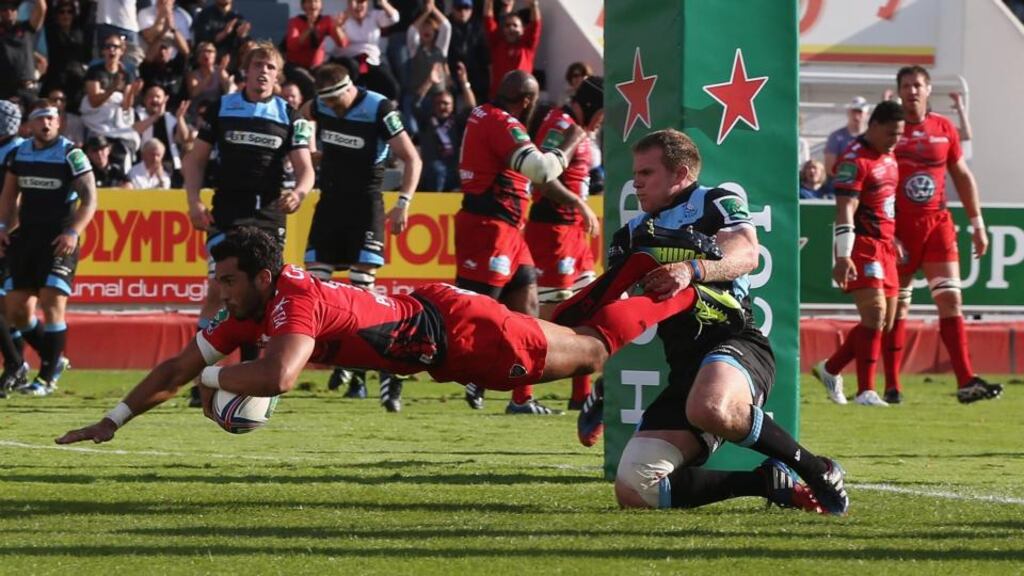 Maxime Mermoz of Toulon dives over for his second try during the Heineken Cup Pool 2 match against Glasgow Warriors at the Felix Mayol Stadium. Photograph: David Rogers/Getty Images