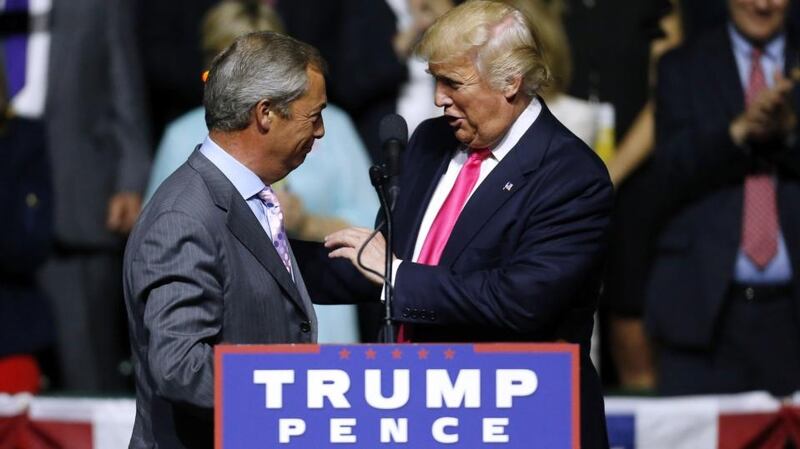 Republican presidential nominee Donald Trump, right, greets Ukip leader Nigel Farage during a campaign rally in Mississippi last week. Photograph: Getty