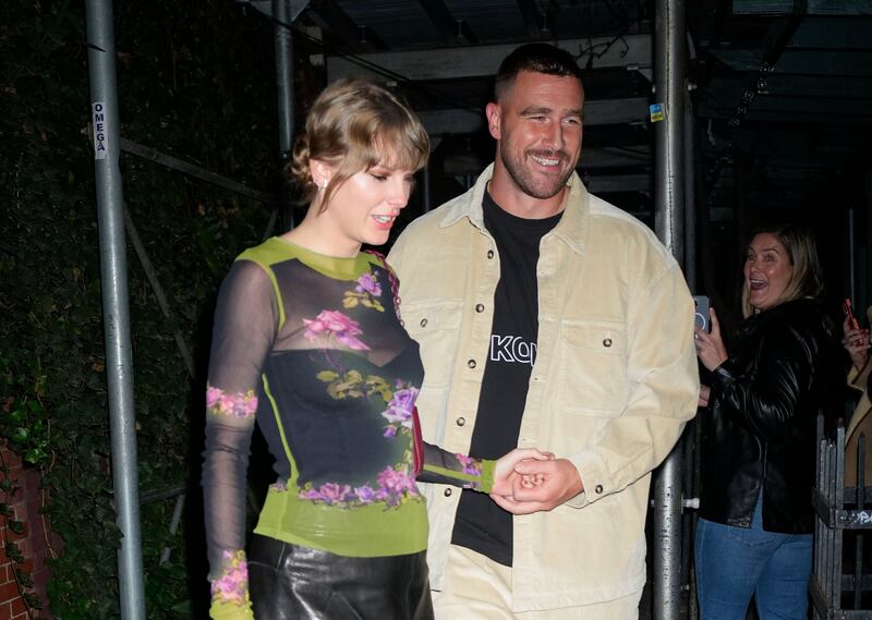 Taylor Swift and Travis Kelce at the Waverly Inn in October 2023 in New York City. Photograph: Gotham/GC Images