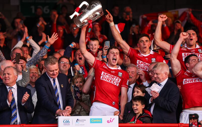 Robert Downey lifts the Mick Mackey Cup after Cork's Munster final win over Limerick. Photograph: James Crombie/Inpho