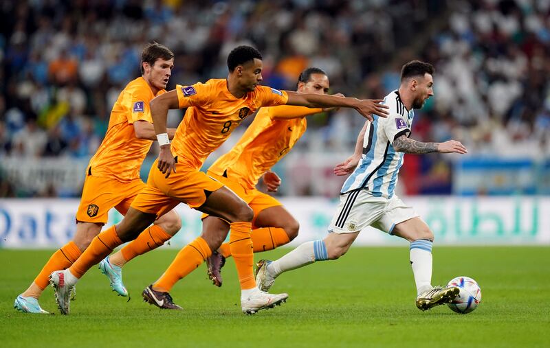 Lionel Messi accelerates away from Netherlands trio Cody Gakpo, Marten de Roon and Virgil van Dijk during the World Cup quarter-finals. Messi has illuminated the World Cup in Qatar and could be set to cap his career with the ultimate honour.