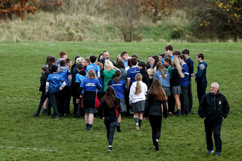 Garry Ringrose is surrounded for autographs and pictures after Leinster's open training session. Photograph: Ben Brady/Inpho