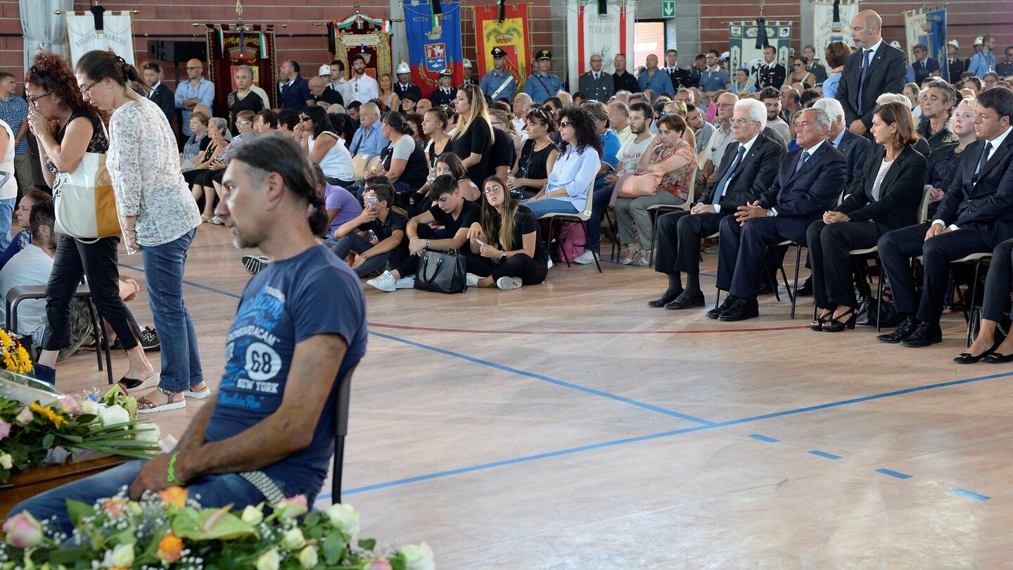Italian president Sergio Mattarella (C) attends a funeral for the earthquake victims inside a gym in Ascoli Piceno, Italy on Saturday. Photograph: Italian presidency press Office/Reuters