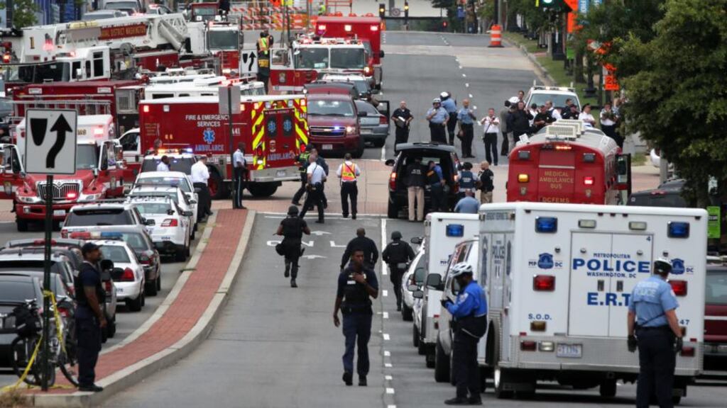 Emergency vehicles and police officers l respond to a shooting at an entrance to the Washington Navy Yard today. Photograph: Alex Wong/Getty Images