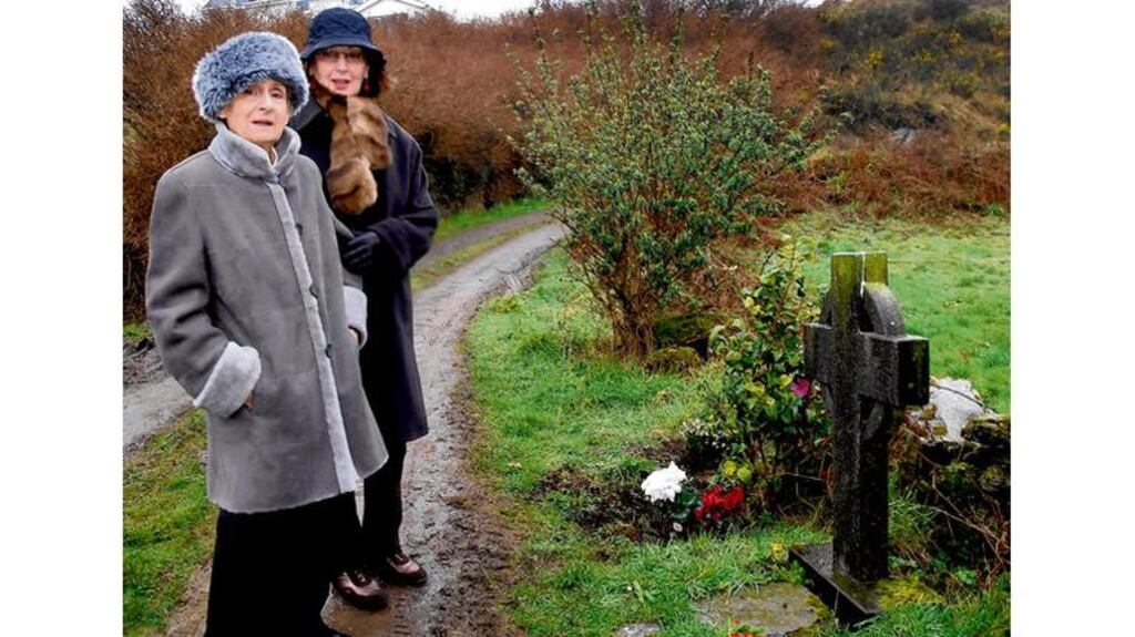 Marguerite Bouniol, mother of Sophie Toscan du Plantier and her friend Marie Paule Bloc-Daudet pause at the memorial cross that marks the spot of the murder. photograph: niall duffy