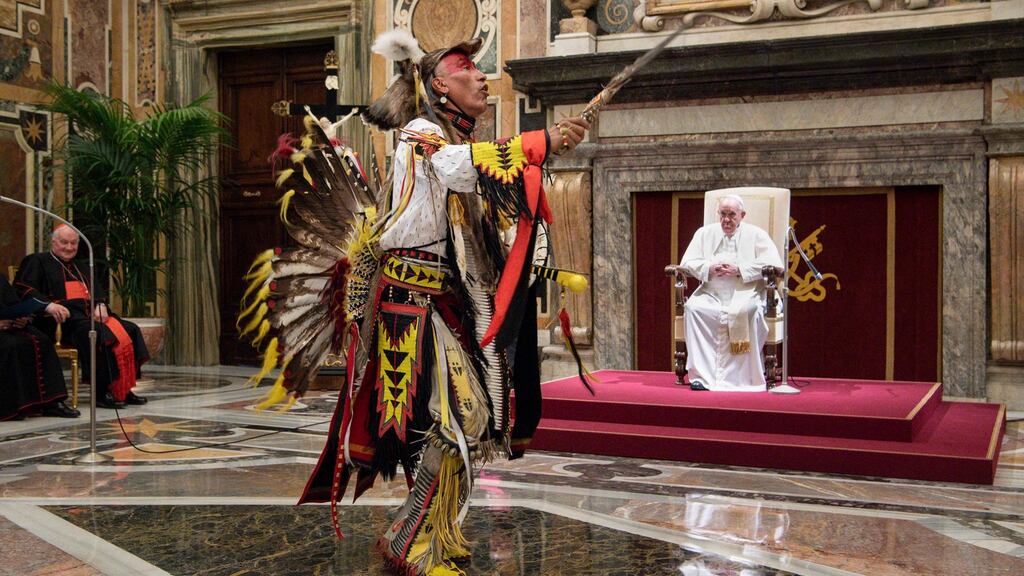 A member of the Indigenous Peoples of Canada in native garb before Pope Francis during an audience at the Vatican. Photograph: Getty Images