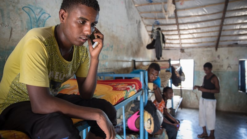 A file photograph of an Eritrean teenager in a dormitory for unaccompanied minors in Shagarab refugee camp, eastern Sudan. Many Eritreans stop here before travelling on towards Libya. Photograph: Sally Hayden