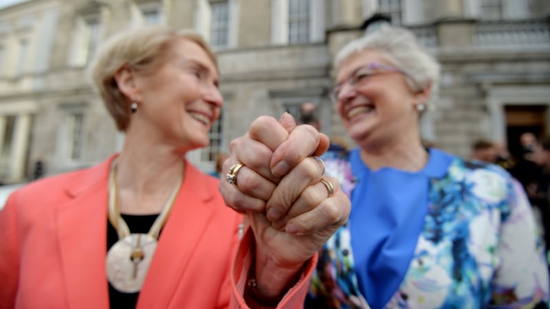 Dr Ann Louise Gilligan and her partner Senator Katherine Zappone on the steps of Leinster House as the Marriage Bill 2015 passed through all stages in the Houses of the Oireachtas. Photograph: Alan Betson