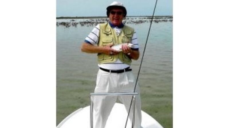 Derek Evans lands a bonefish from the Marls on Abaco Island in the Bahamas.
