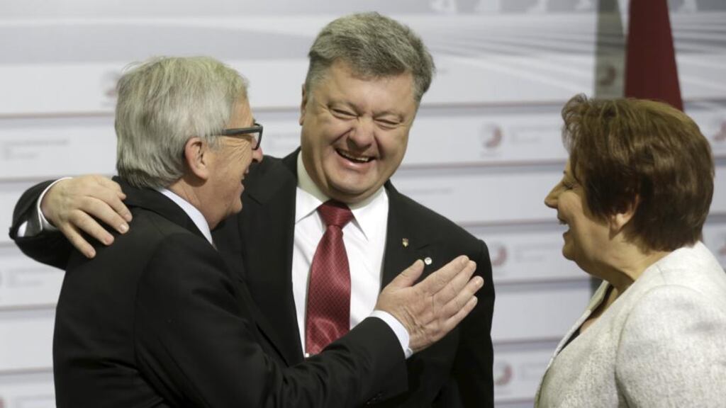 European Commission president Jean-Claude Juncker (left), Ukraine’s president Petro Poroshenko and Latvia prime minister Laimdota Straujuma before the Eastern Partnership summit session in Riga, Latvia, on Friday. Photograph: Reuters/Ints Kalnins