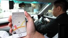 Uber settles major lawsuit over driver employment status