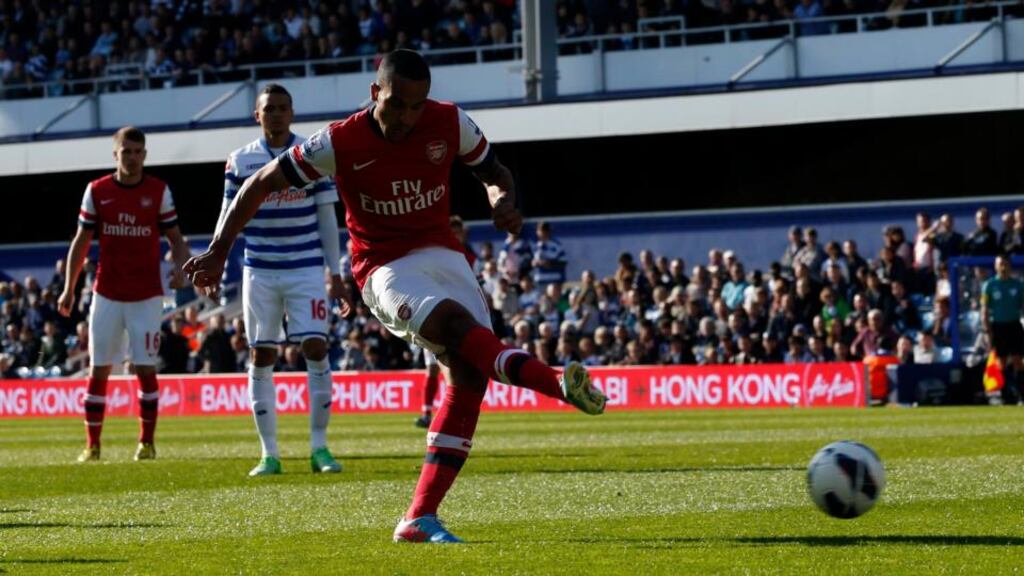 Arsenal’s Theo Walcott scores against QPR during the Premier League at Loftus Road. Eddie Keogh/Reuters