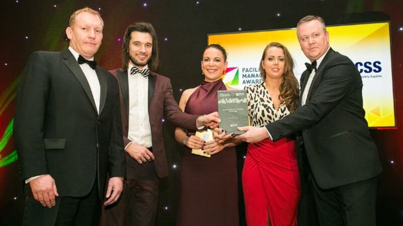 Karen O’Connor, Deb Group and Claire Murphy, FM Sector Leader, Bunzl Cleaning & Safety Supplies presents the Cleaning Service Provider of the Year award to Jonathan McKinlay, Gavin Annon and Cathal Geoghan