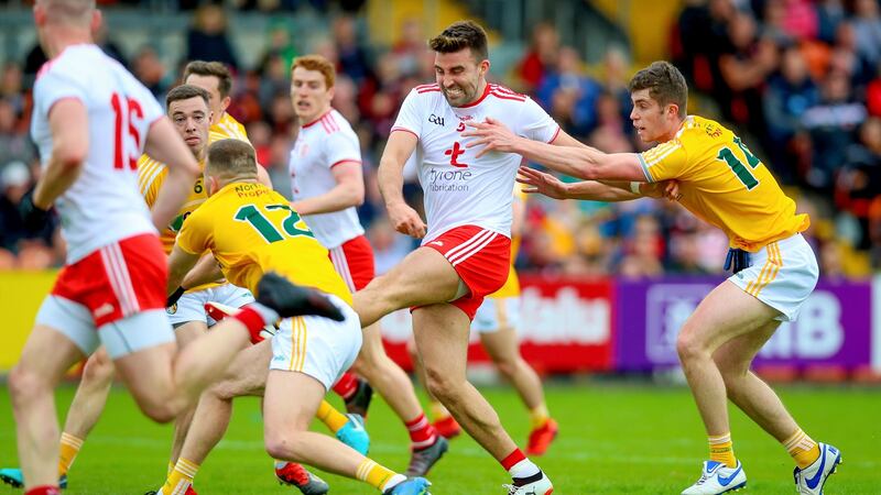 Tyrone’s Tiernan McCann scores a goal against outclassed Antrim in the Ulster championship. Photograph: Tommy Dickson/Inpho