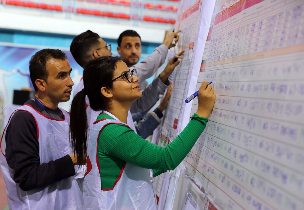 Tunisian electoral officials count votes - turnout was at 8.8 per cent of the nine million voters registered. Photograph: Mohamed Messara/EPA