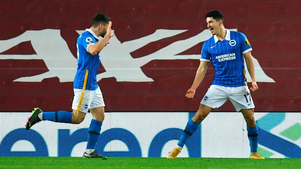 Brighton’s Steven Alzate celebrates with Neal Maupay after scoring the winner against Liverpool at Anfield. Photo: Paul Ellis/Getty Images
