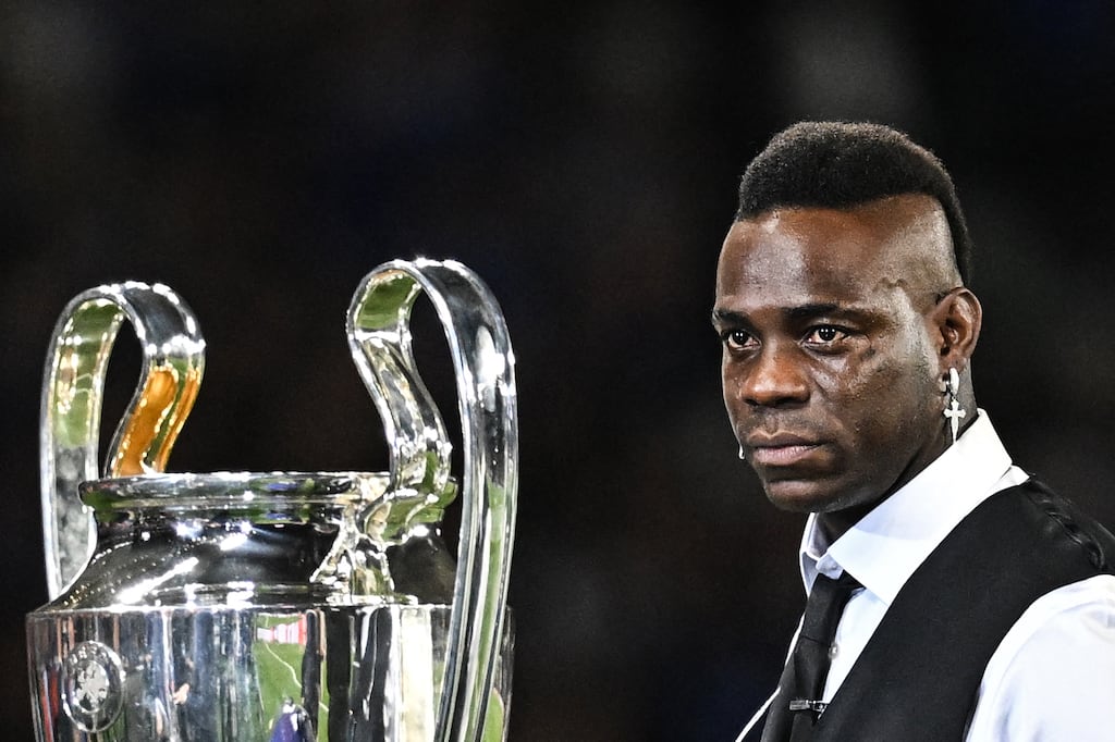 Former Inter Milan player Mario Balotelli, working as a pundit for BT Sport, and probably thinking about how his earrings are too heavy. Photograph: Paul Ellis/AFP via Getty Images