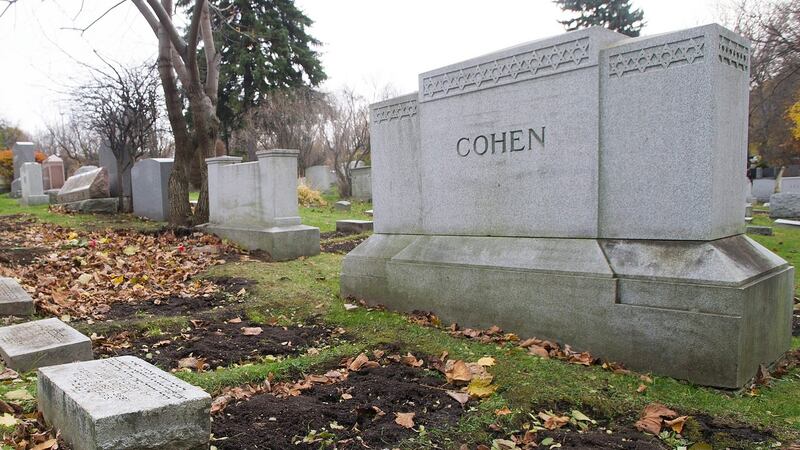 Leonard Cohen’s family burial plot in a cemetery in Montreal. Photograph: Graham Hughes/The Canadian Press via AP