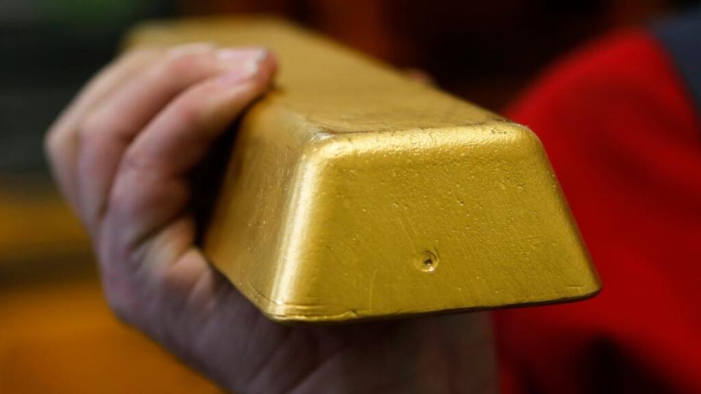 Gold slid the most in two years during 15 minutes of Asian trading Monday as the dollar held onto recent gains. (Photograph: Leonhard Foeger/Reuters)