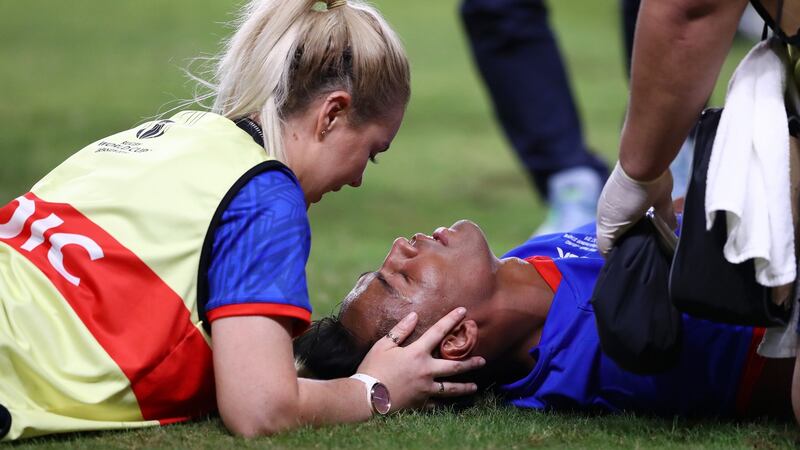 Samoa’s Ulupano Seuteni down after a tackle by Bundee Aki. Photograph: Michael Steele/Getty