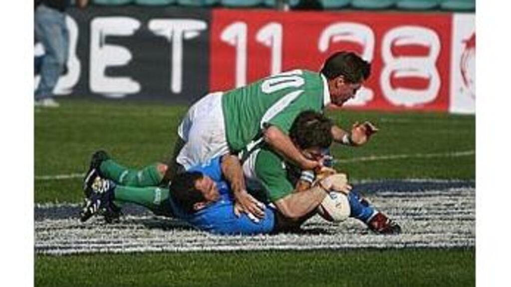 Man of the match Gordon D'Arcy forces the ball down to score
Ireland's third try