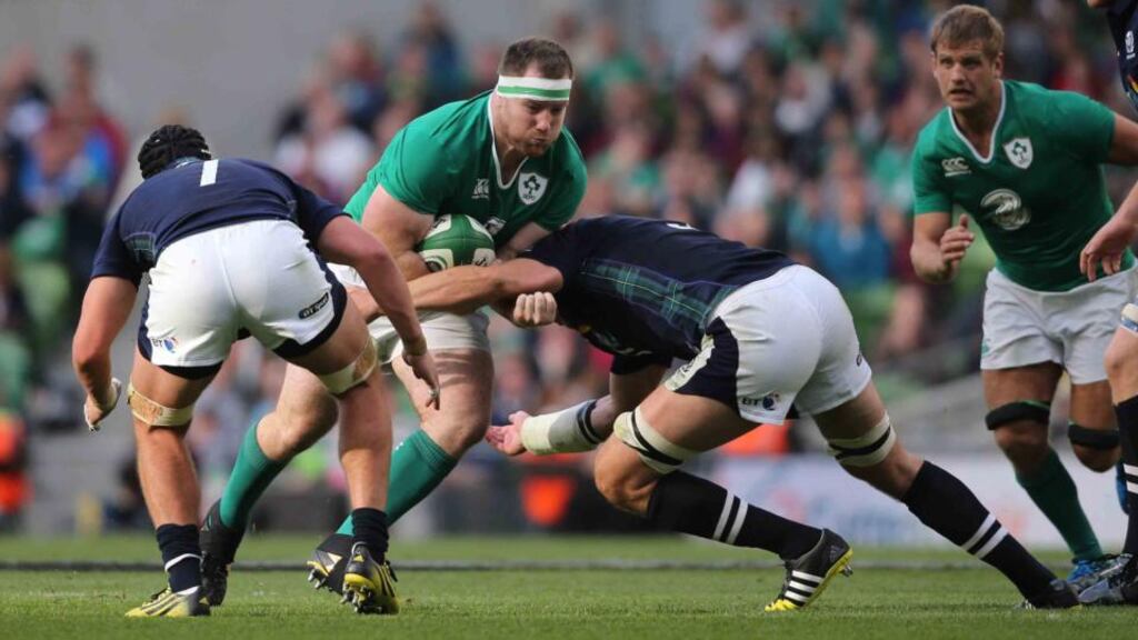 Ireland’s Michael Bent is tackled by Scotland’s Grant Gilchrist during the World Cup warm-up match at the Aviva Stadium, Dublin. Photo Niall Carson/PA