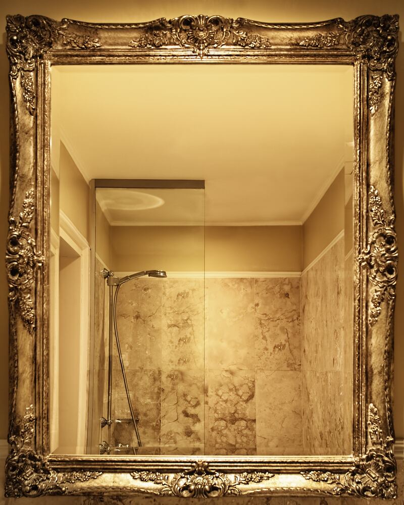 An ornate mirror can add interest to a bathroom – and think about whether or not your bath is just taking up space