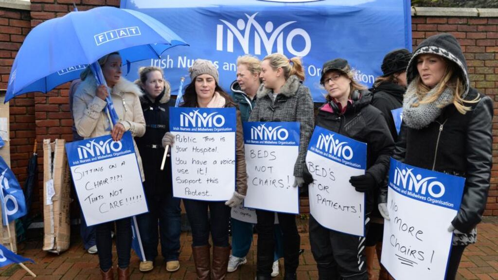 Nurses  protest at Beaumont Hospital in Dublin last week over overcrowding in the emergency department. Union members in Galway have now voted in favour of industrial action. Photograph: Cyril Byrne/The Irish Times.