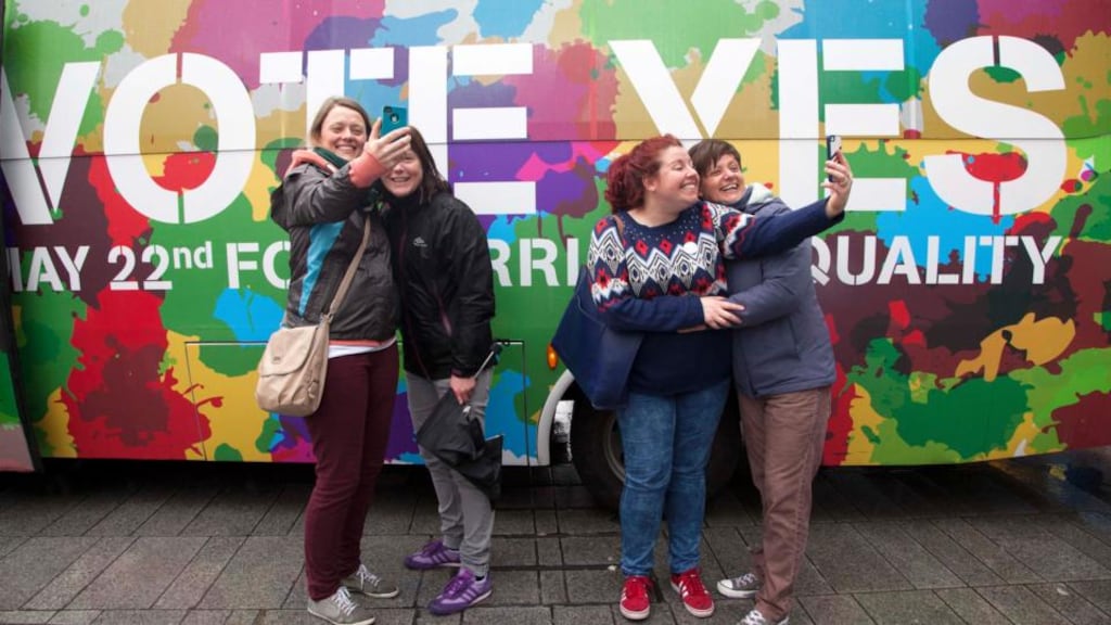 Couples Suzanne Cahill and Tina Keane, and Cathy Murrey and Lisa Cresswell at the Yes Equality Bus in Cork. Photograph: Clare Keogh