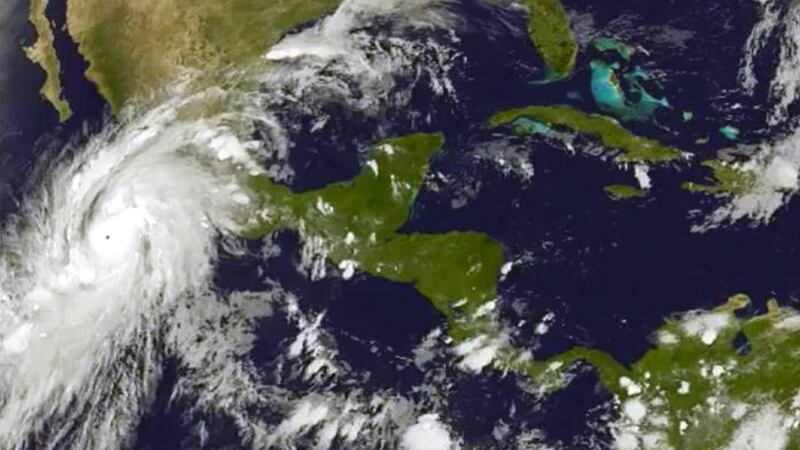 A handout satellite picture released by the US National Oceanic and Atmospheric Administration  on October 22nd shows Hurricane Patricia as it approaches the coastline of Mexico from the eastern Pacific. Photograph: EPA
