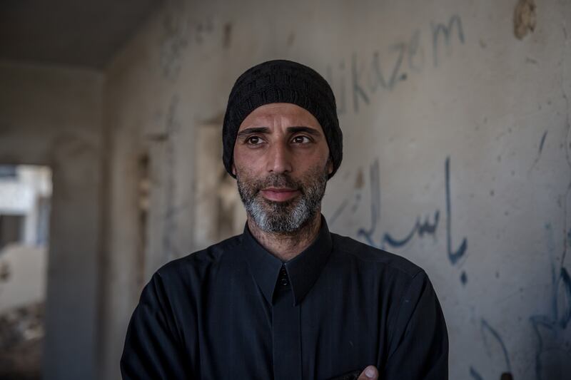 Mohamed Subih Daher has been collecting information about his neighbourhood, Khaldiyeh, to help with rebuilding. Photograph: Sally Hayden
