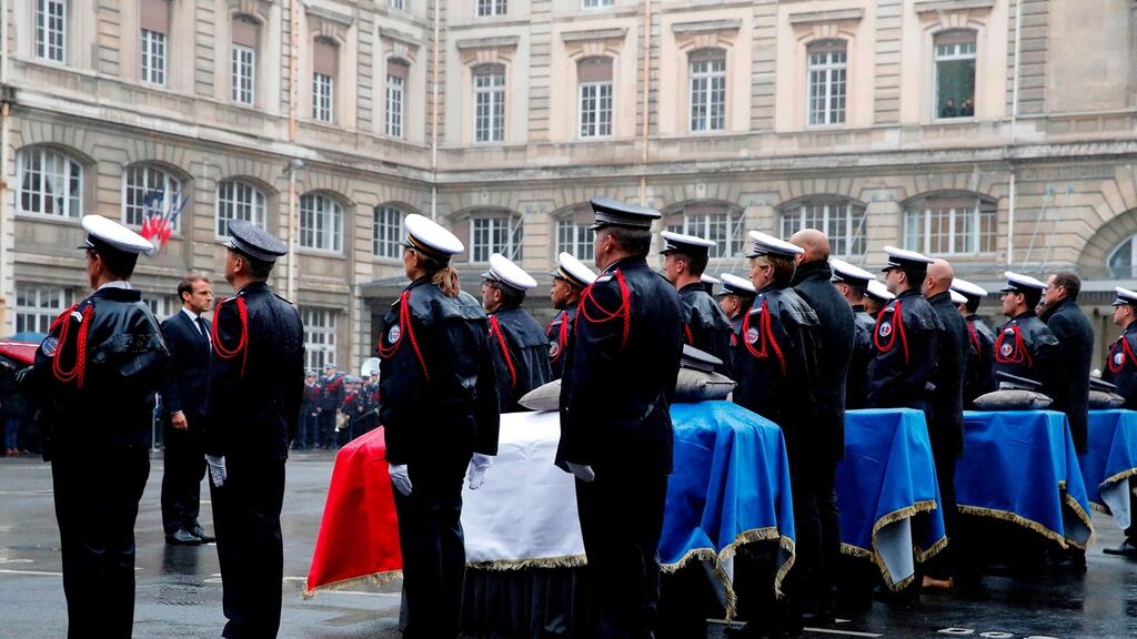 French president Emmanuel Macron participates in a ceremony at Paris police headquarters to pay respects to the victims of an attack on October 4th. Three police officers and an administrative worker were murdered. Photograph: Francois Mori