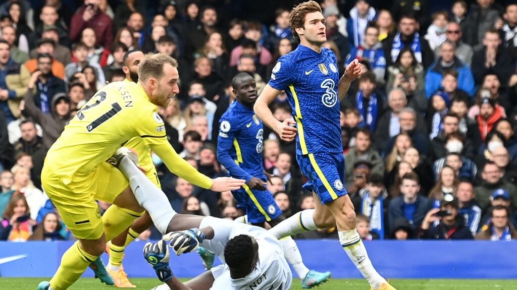 Brentford’s midfielder Christian Eriksen collides with Chelsea’s goalkeeper Edouard Mendy after scoring a goal during the match between Chelsea and Brentford. Photograph: Glyn Kirk/AFP via Getty